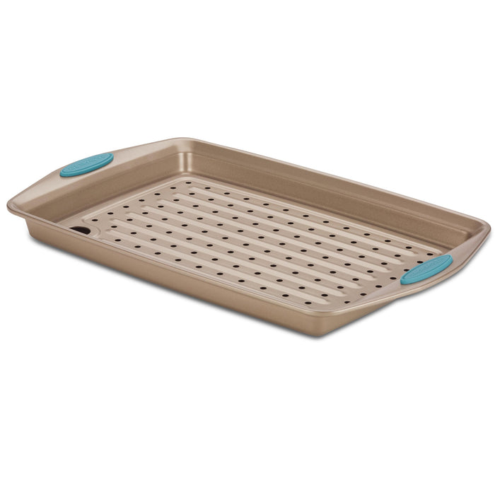 Introducing the 10-Inch x 15-Inch Nonstick Crisper Pan Set, featuring blue handles against a white backdrop. Made from heavy gauge steel for long-lasting durability, this baking tray is perfect for crisping, ensuring even cooking and effortless release every time.