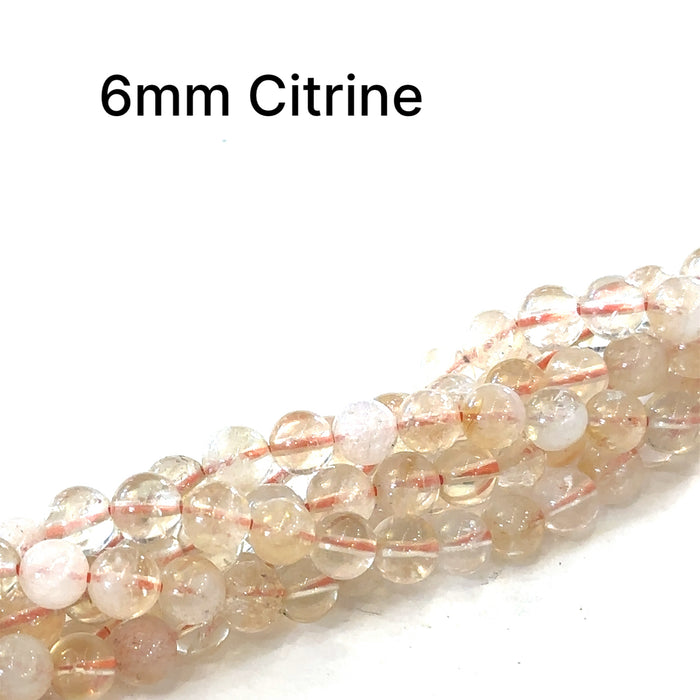 One Citrine 6mm round 15'' gemstone strand