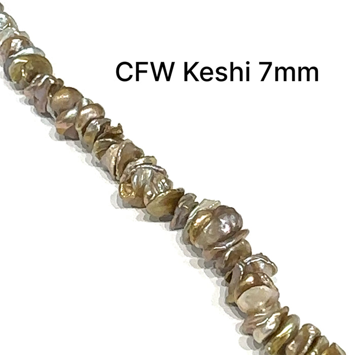 One Green 7mm Fresh Water Keshi Pearl 15'' strand (centered drilled)
