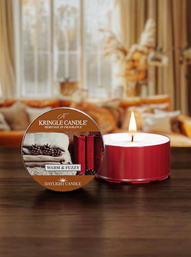 Kringle Candle daylight candle with packaging on a wooden surface