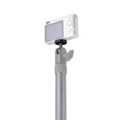 The 20mm Metal Ball to 1/4-20 Camera Bolt Adapter lets you secure a compact digital camera to a silver telescopic pole with an adjustable joint and tightening knob for versatile mounting options.