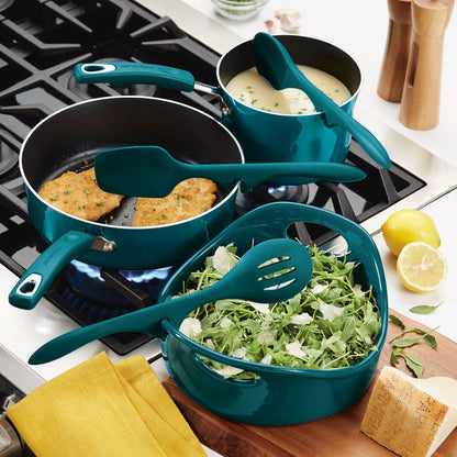 Teal cookware featuring chicken, soup, and arugula with cheese on the stove is beautifully complemented by the 3-Piece Lazy Tool Set for an effortless cooking experience.