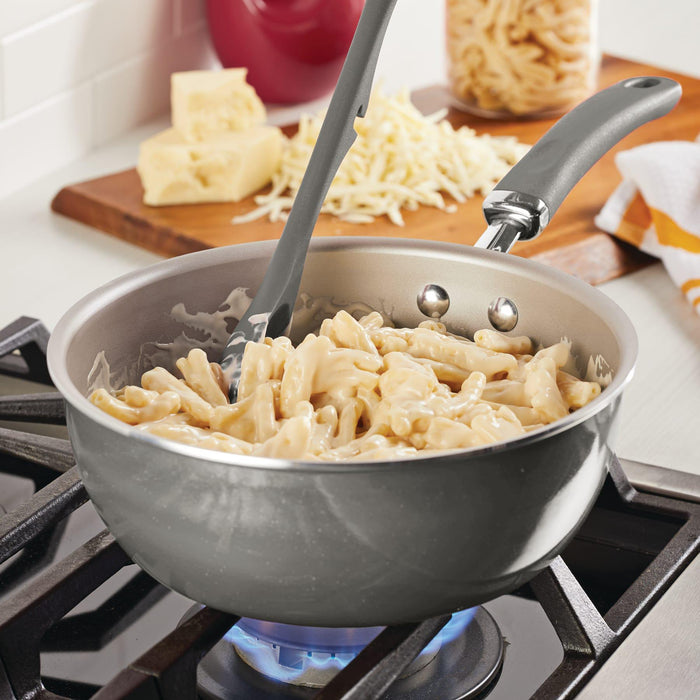 Creamy pasta is stirred in a 3-Quart Nonstick Induction Everything Pan.
