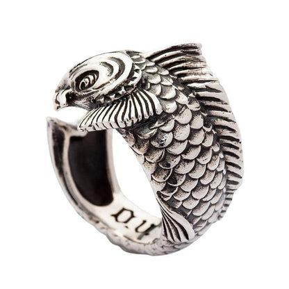 A unisex adjustable fish ring in sterling silver, perfect as a good fortune gift.