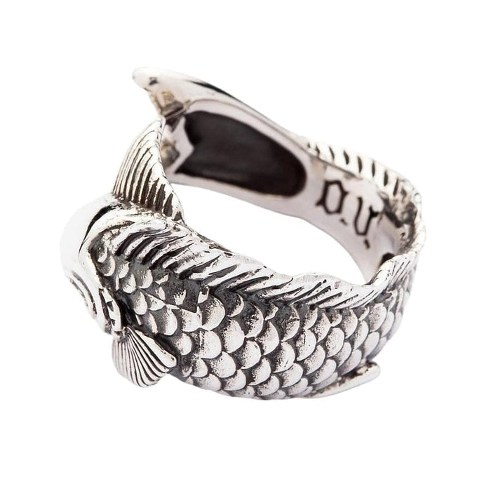 A side profile of the silver Koi ring, highlighting the intricate, hand-carved scales.