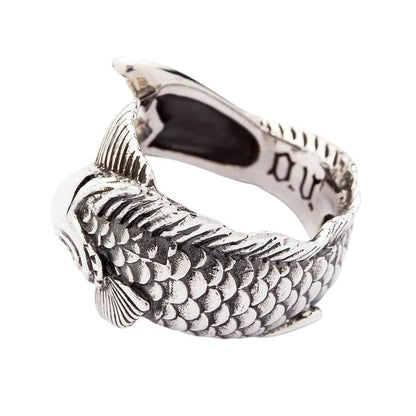 A side profile of the silver Koi ring, highlighting the intricate, hand-carved scales.