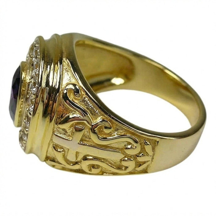 Close-up detailing the ornate scrollwork and cross motif carved into the tapered yellow gold shank.