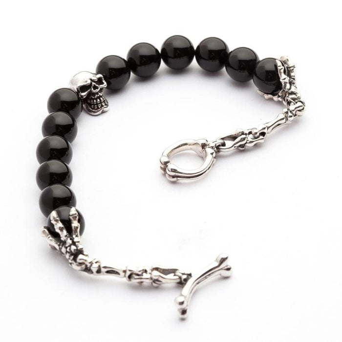 Handcrafted black onyx beads with skeleton hand detail silver bracelet