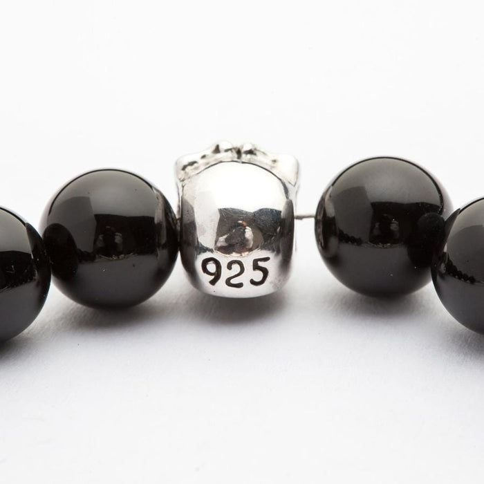 The back of the silver skull bead, clearly showing the .925 solid sterling silver authenticity stamp.