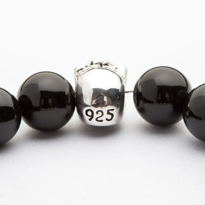 The back of the silver skull bead, clearly showing the .925 solid sterling silver authenticity stamp.