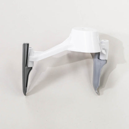 NutriMill bowl scraper attachment on a grey background