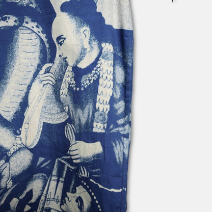 Close view of the blue and white print on the Brahma shirt sleeve and front