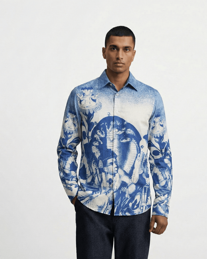 Man wearing the Brahma shirt with dark jeans, front view, hand in pocket
