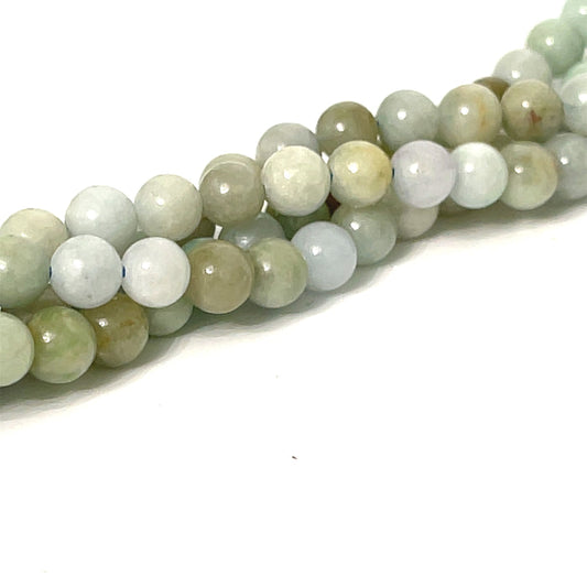 Burma Jade 6mm smooth round gemstone strand on a white background, front overview.