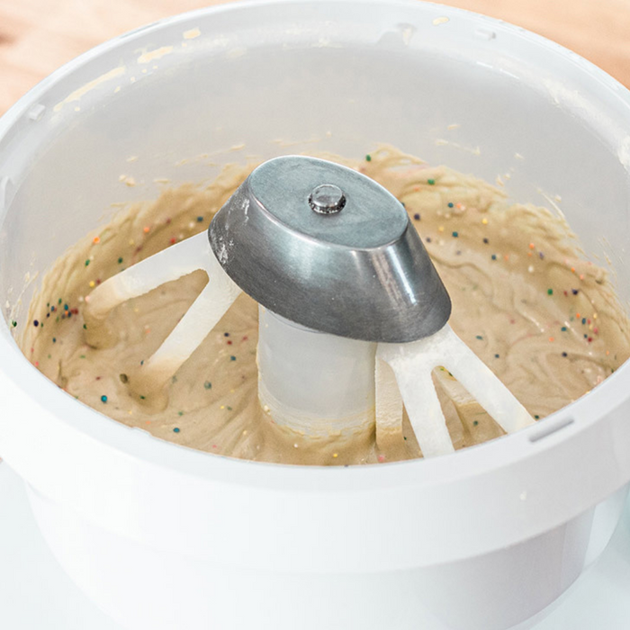 NutriMill cake paddles mixing white cake batter