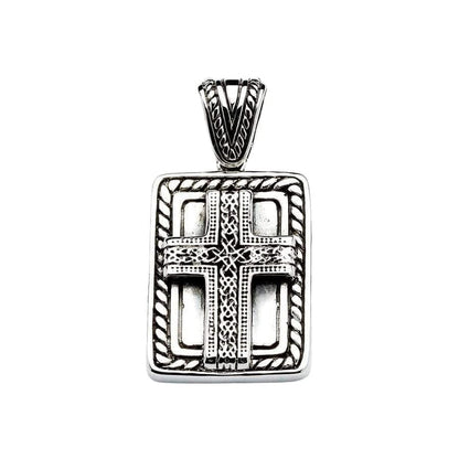 Close-up focusing on the continuous knotwork pattern and twisted rope border of the silver dog tag pendant.