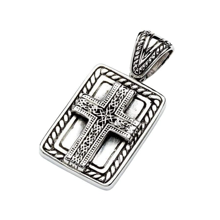 Tilted view highlighting the intricately carved V-shaped bail and openwork frame of the oxidized silver cross pendant.