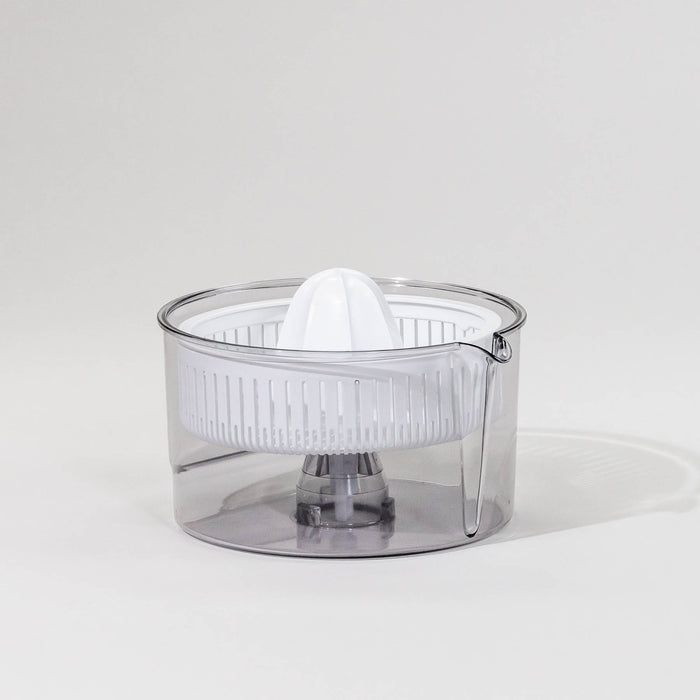 Bosch citrus juicer attachment on a grey background