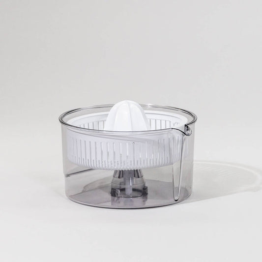 Bosch citrus juicer attachment on a grey background
