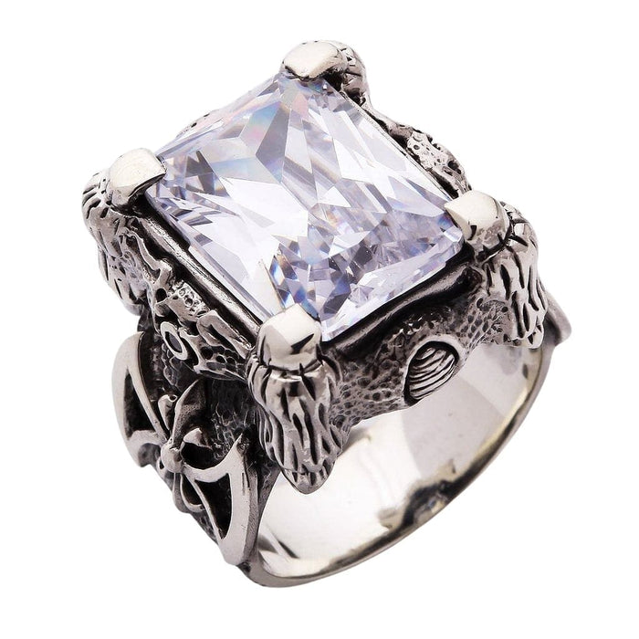 A fantasy ring for men with a 36-carat clear CZ stone, worn to demonstrate its bold and luxurious scale.