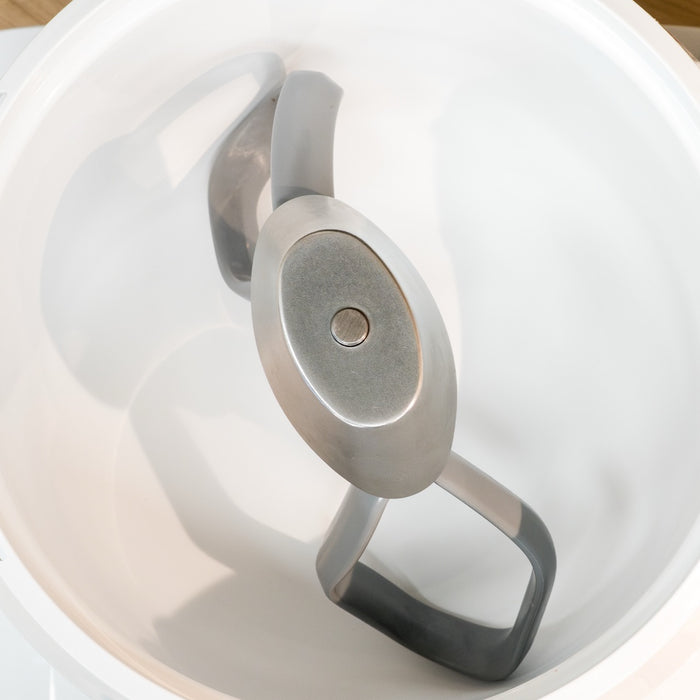 NutriMill pro line cookie paddles with metal whip driver in white bowl