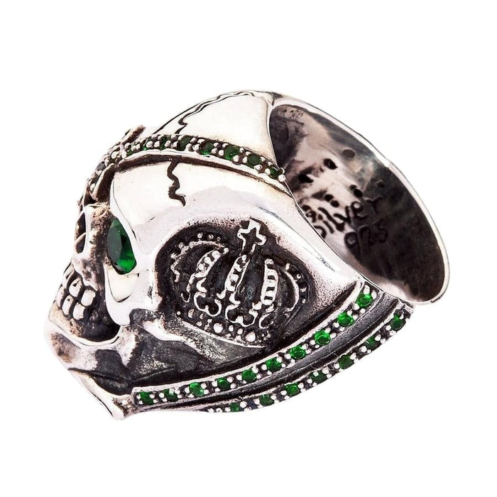 Side profile of the silver ring showcasing the intricate royal crown carving.