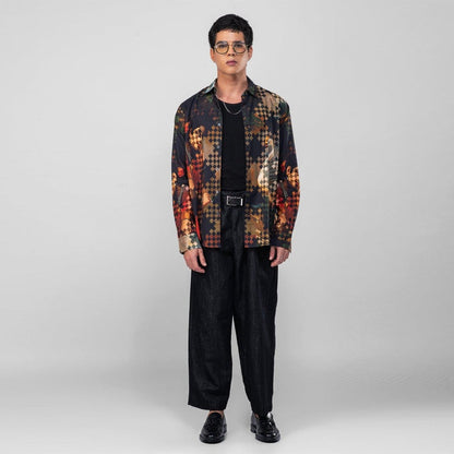 Man wearing the Damayanti's Secret shirt open over a black tee, full length front view
