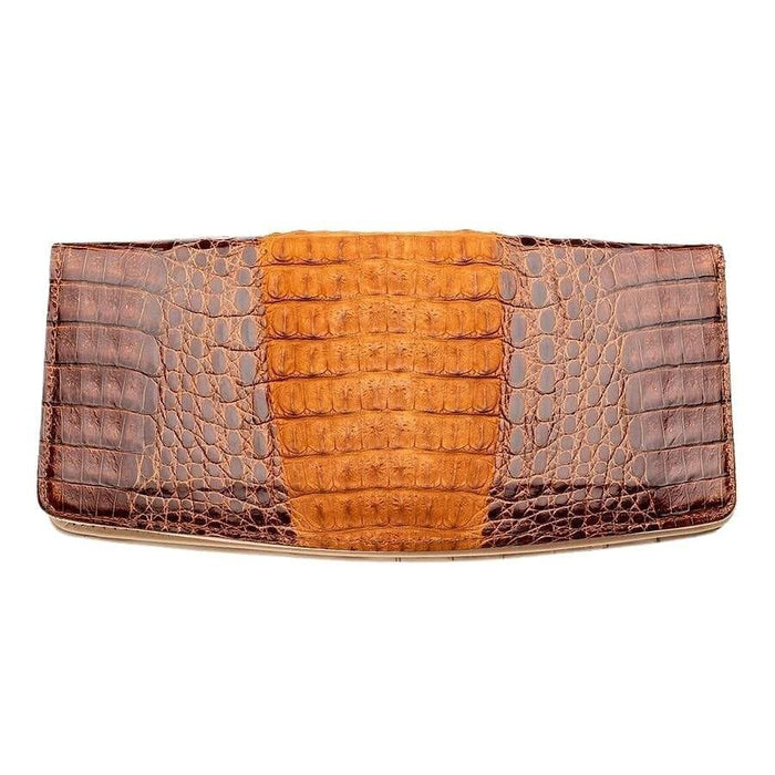 Back exterior of a two-tone crocodile leather long wallet showing raised tan dorsal scales flanked by glossy dark brown sides