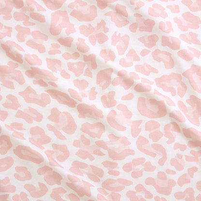 Pink and white patterned fabric texture