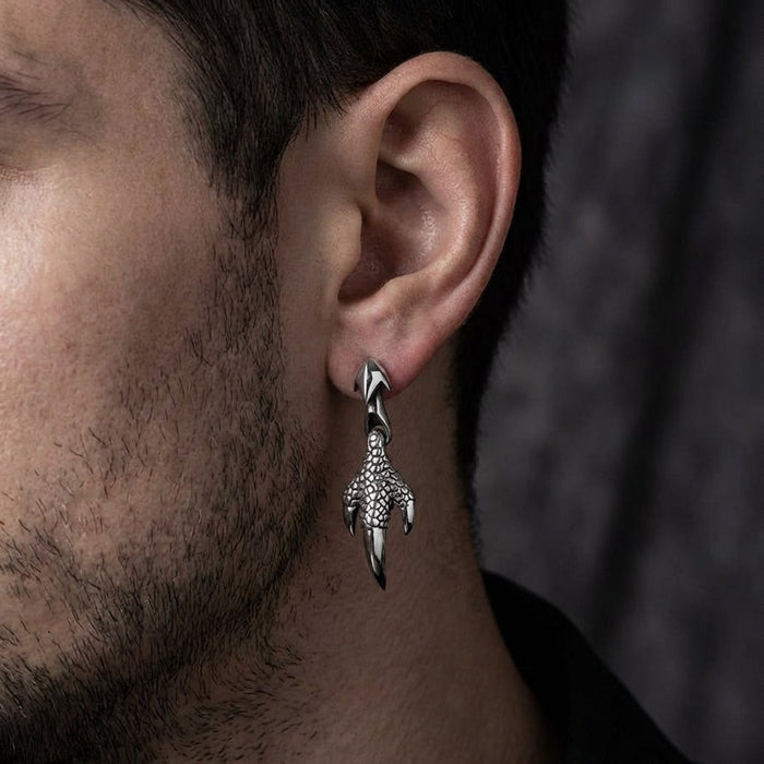 Dragon claw earring worn on model showing gothic statement jewelry styling