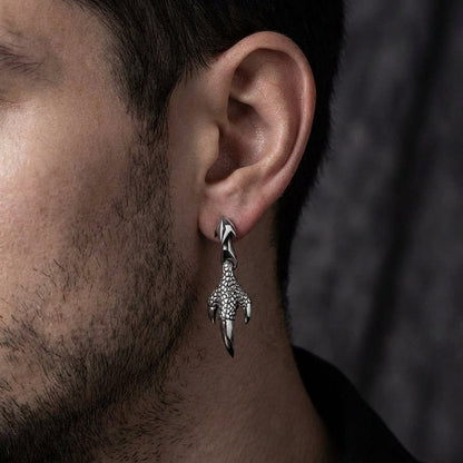 Dragon claw earring worn on model showing gothic statement jewelry styling