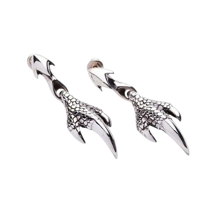 Side angle of handcrafted sterling silver dragon claw earrings with oxidized details