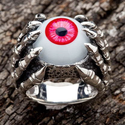 Front view of 925 sterling silver gothic ring with red eyeball gripped by dragon claws