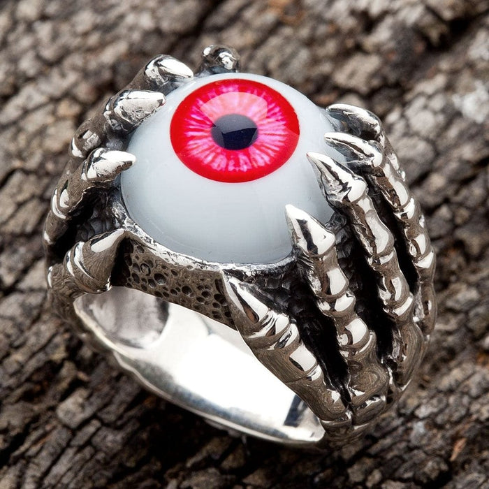 Side angle of 925 silver eyeball ring showing claw detail and ring profile