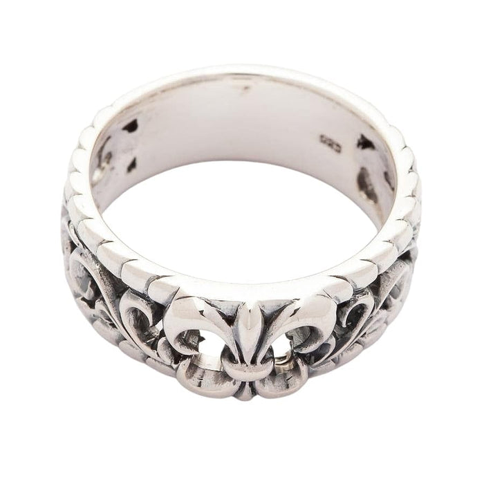 Top-down view looking through the silver band ring, showing the ring's thickness and interior hallmark.