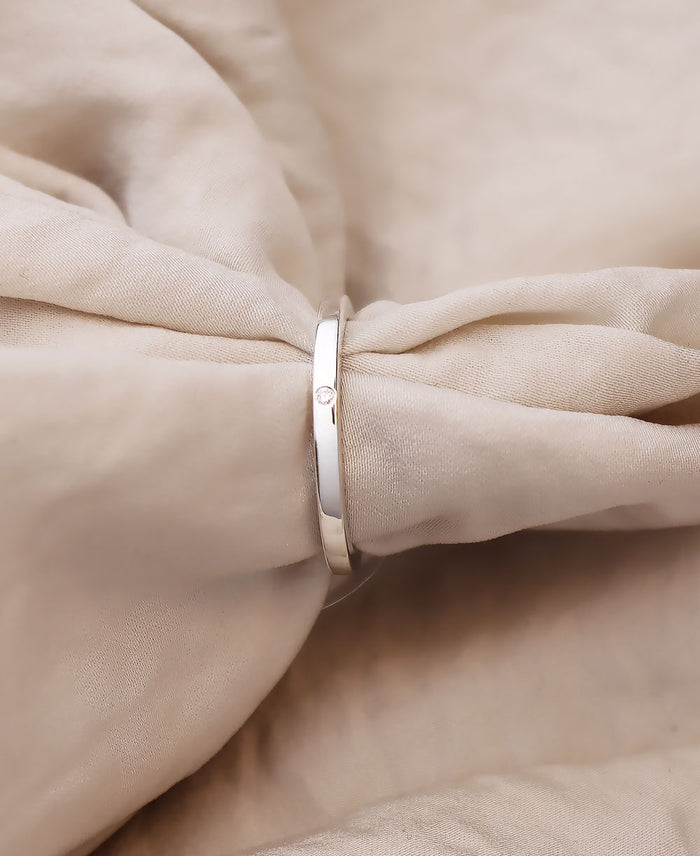 Silverring med liten diamant - vigselring / förlovningsring