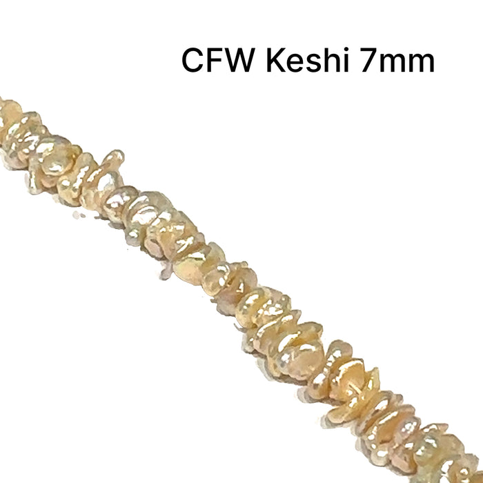 One peach 7mm Fresh Water Keishi Pearl 15'' strand (centered drilled)