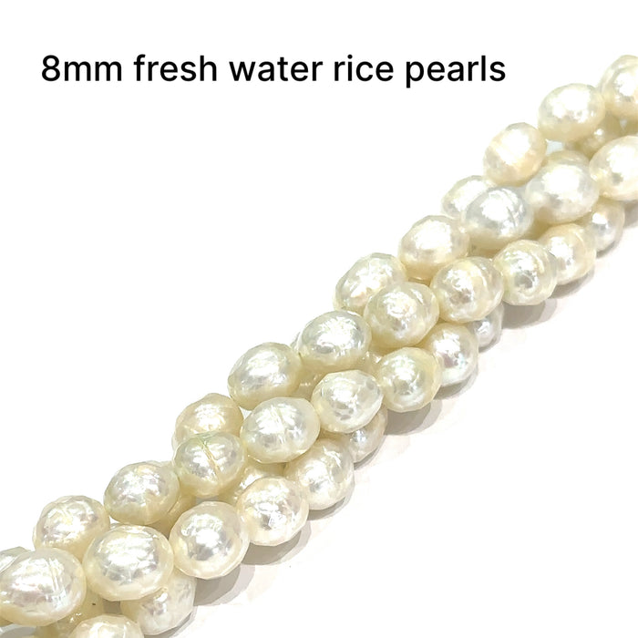 One 8mm White Fresh Water Faceted Pearl 16'' strand