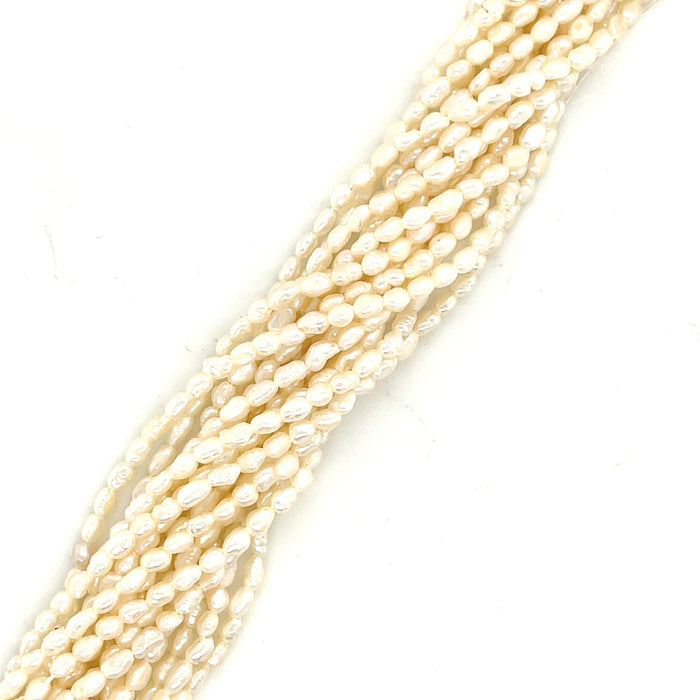 One White Rice 2.5mm Fresh Water Pearls 16'' strand