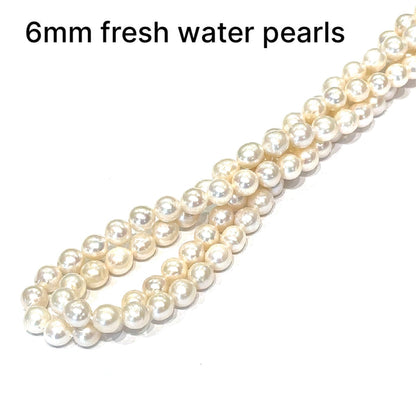 One 6mm White Fresh Water Pearl 16'' strands