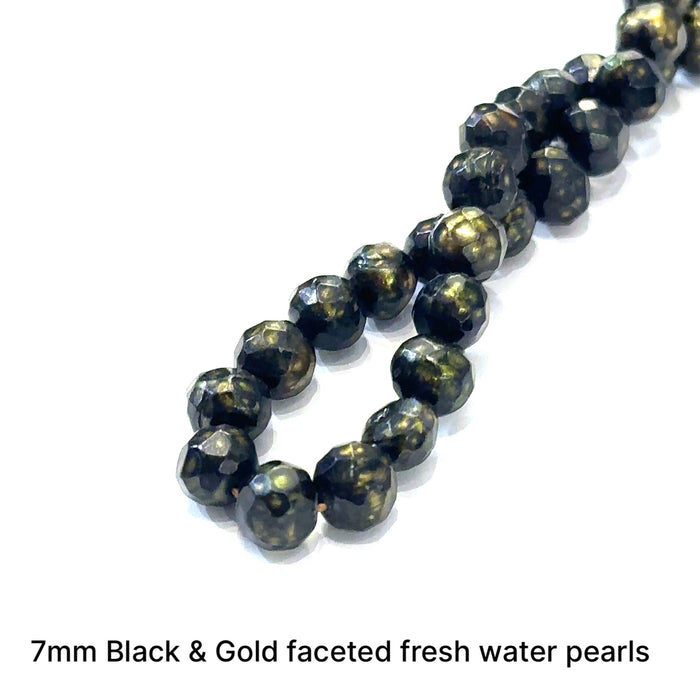 One 7mm Black & Gold faceted round Fresh Water Pearl , 16'' strand