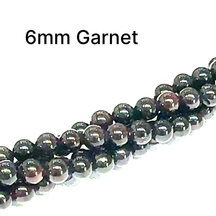 One Red Garner 2.5mm round 16'' gemstone strand (Sir Lanka)