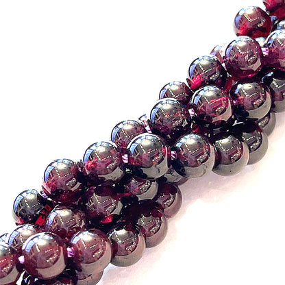 One Red Garnet 6mm round 16'' gemstone strand (Sir Lanka)