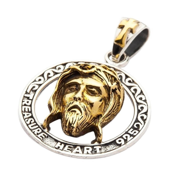 Gold-plated Jesus face pendant in sterling silver open circle frame angled left view with scroll pattern border