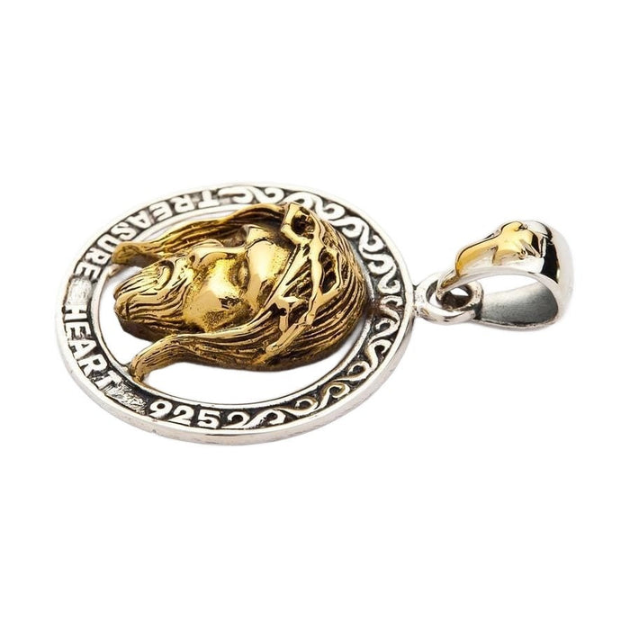 Side profile view of 925 silver Jesus pendant showing three-dimensional gold-plated face and cross bail