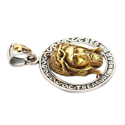 Left side profile of Jesus face pendant showing sculpted depth and Treasure Heart 925 engraved silver border