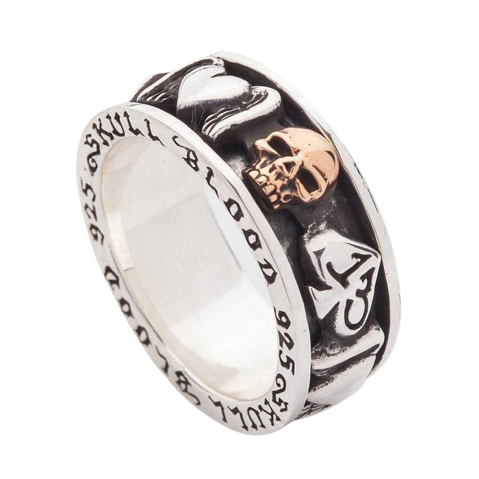 An angled view of the biker symbols spinner ring, showing the 13 spade and gold skull.