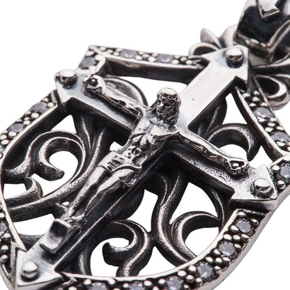 Close-up detail of Jesus figure on the Gothic silver shield pendant