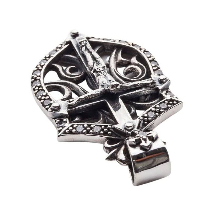 Detailed macro shot of the cross design on the pendant's bail