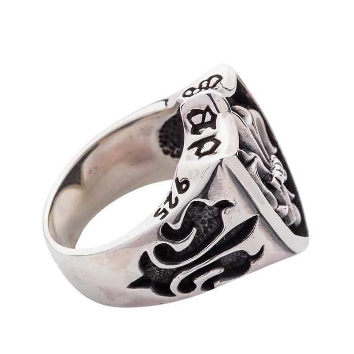 Side detail of the handcrafted gothic shield ring, showing the 925 stamp and gothic band carvings.